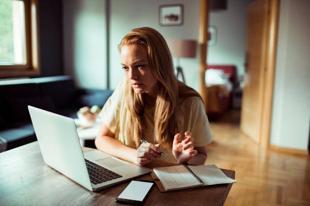Close up of a young lady working from home